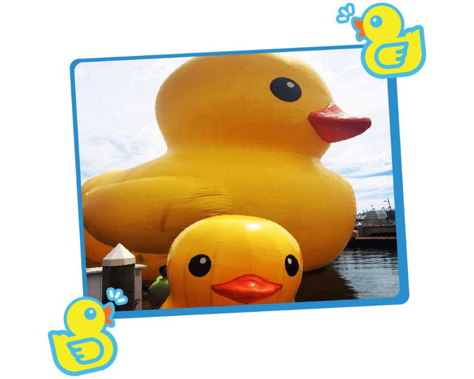 60-foot tall Mama Duck behind 10-foot tall Timmy the Duckling